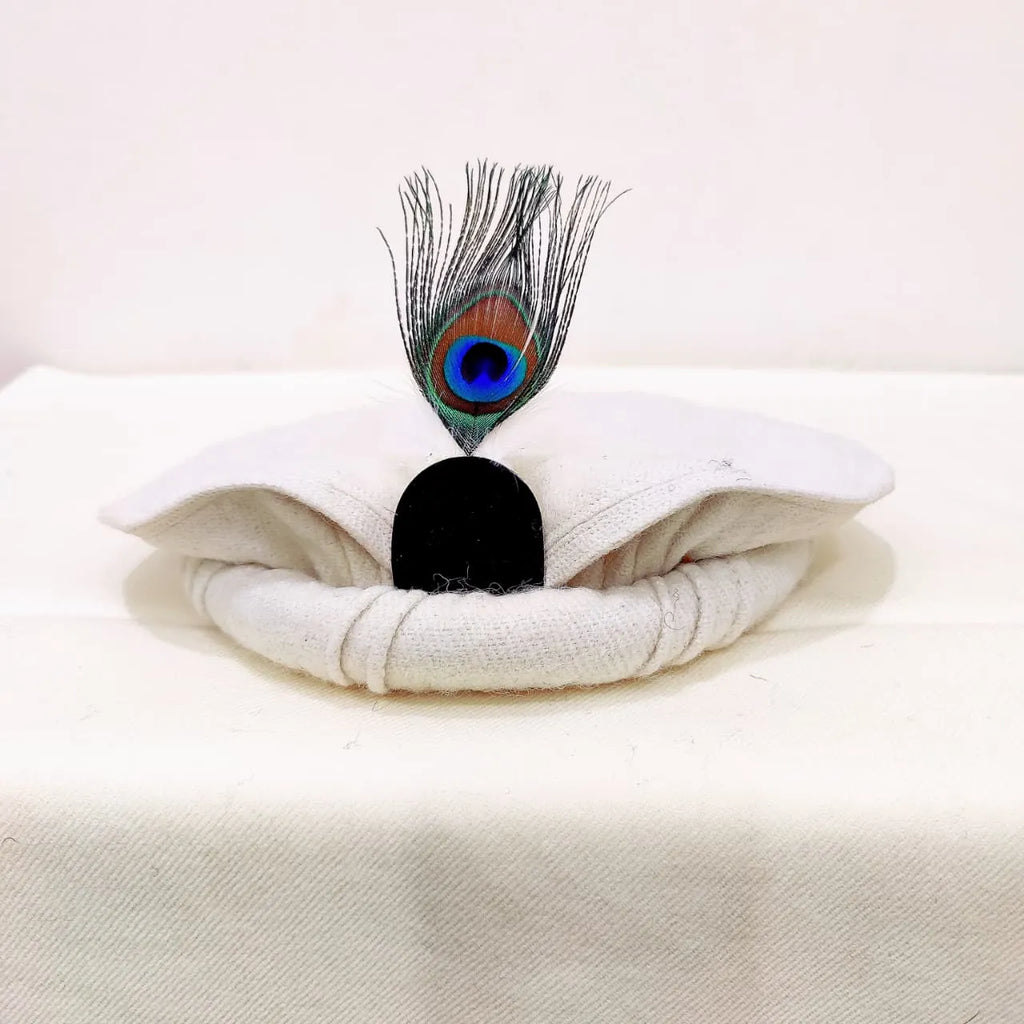 Elegant White Chitrali Pakool with Feather Accent